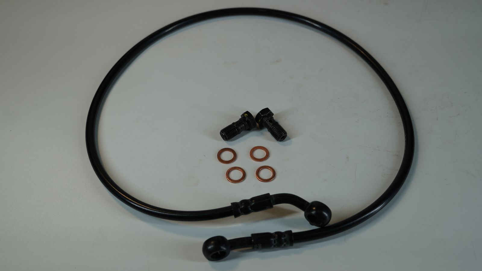 Тормозной шланг (блок ABS - задний тормозной цилиндр) 36JR0086 BAJAJ