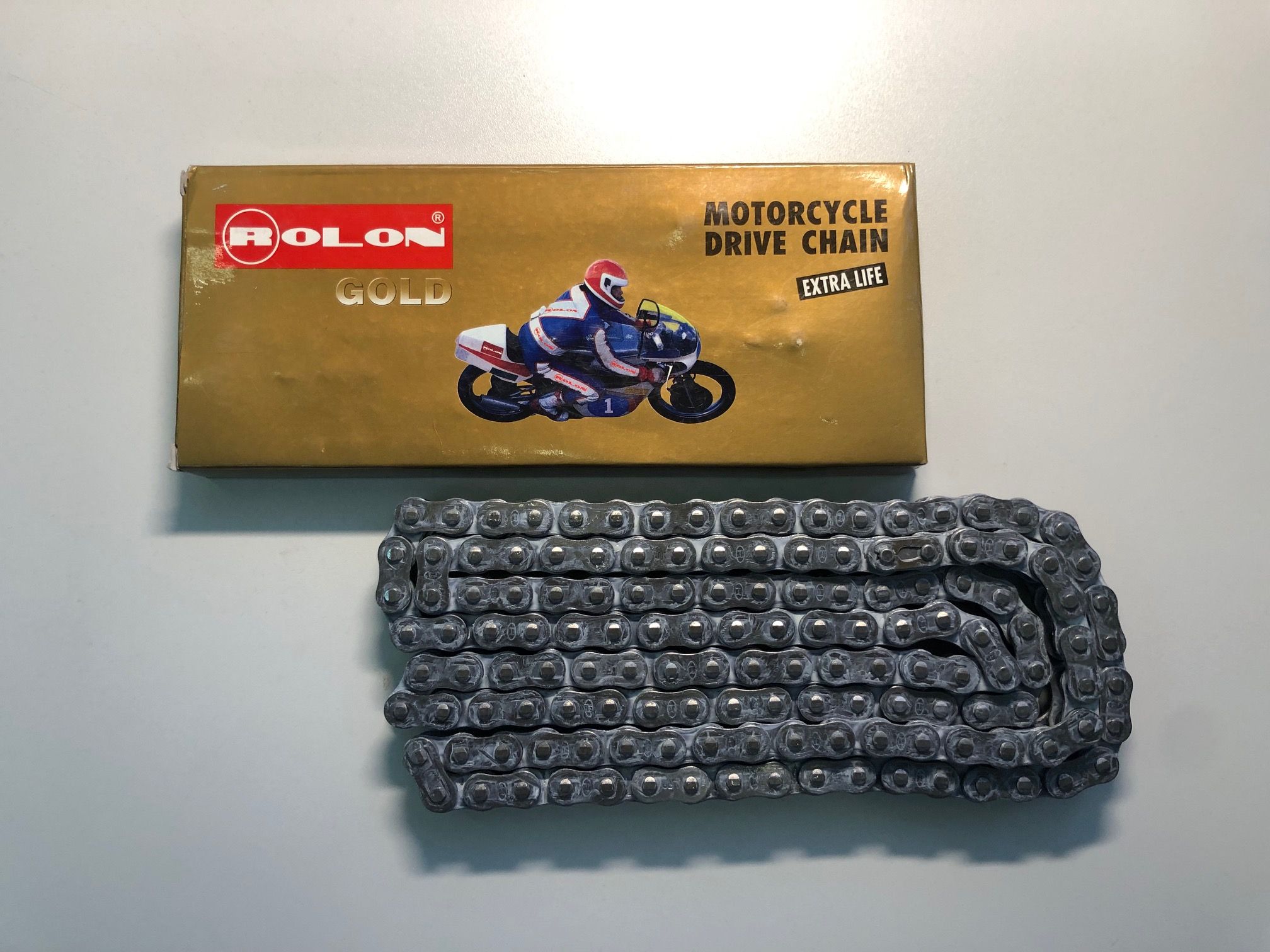 Цепь ROLON 428NXR 140 звеньев, сальниковая X-Ring, замок защёлка R428NXR-140-01 ROLON