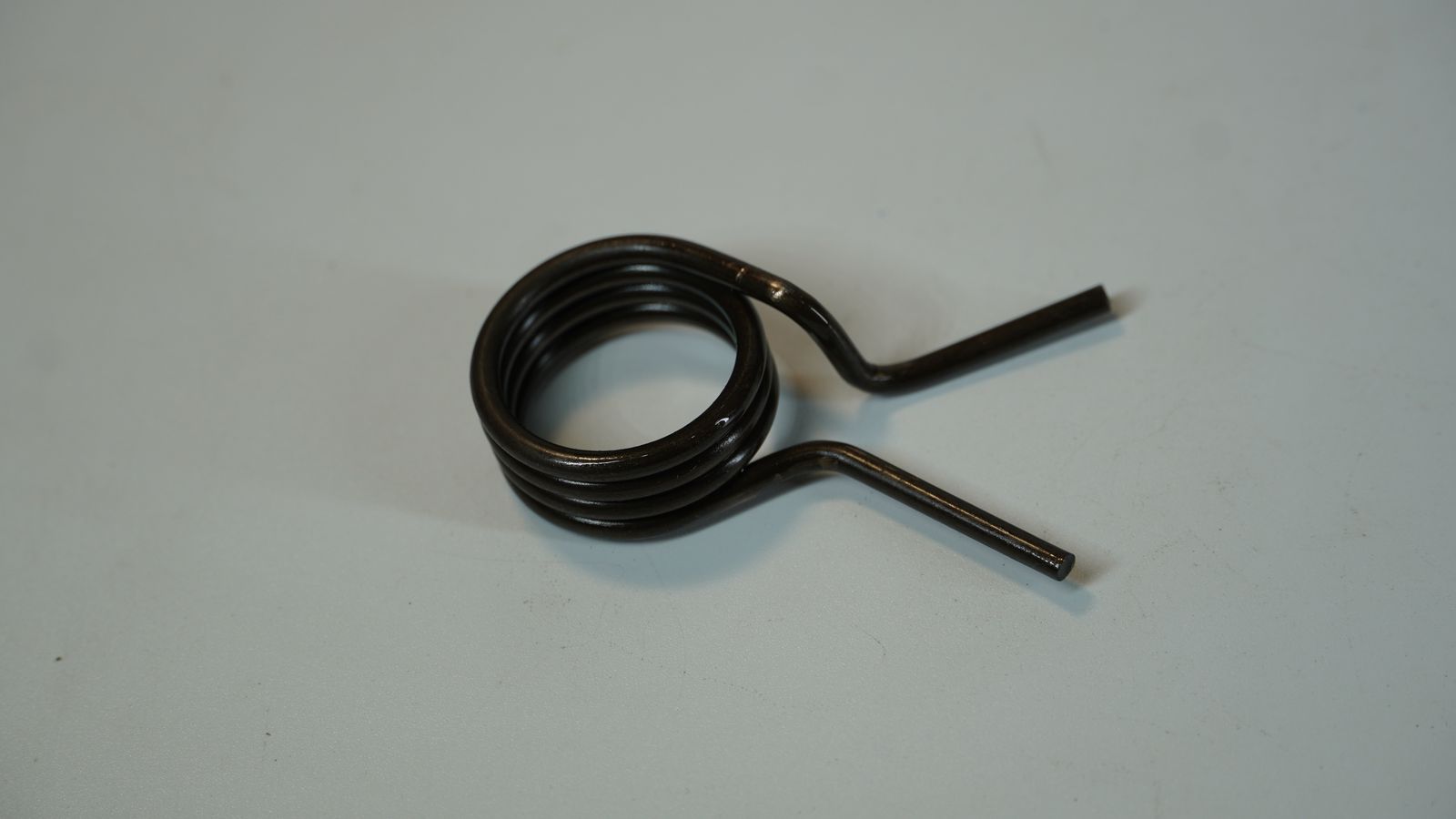 Пружина возвратная вала переключения передач GL561049 BAJAJ