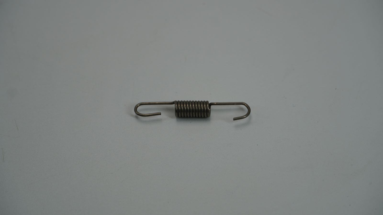 Пружина заднего выключателя тормоза PA161004 BAJAJ