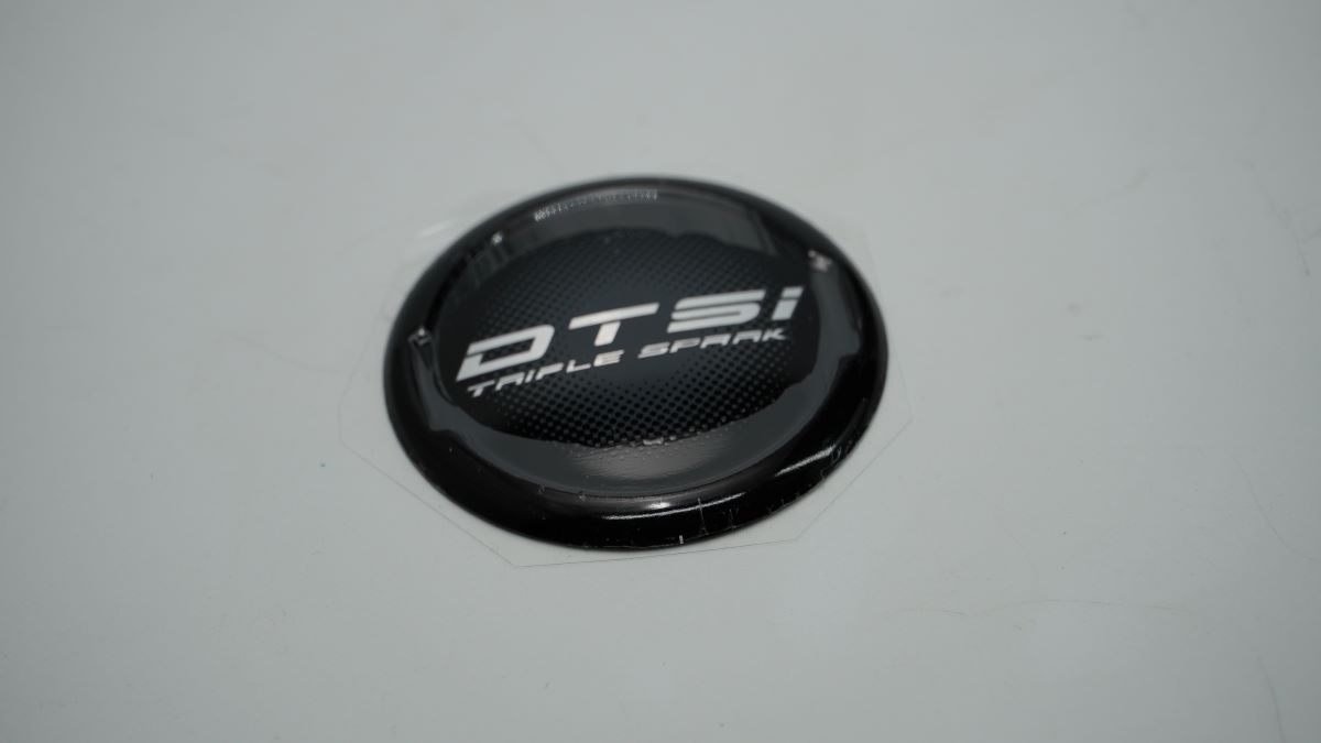 Наклейка логотип крышки сцепления JF233219 BAJAJ