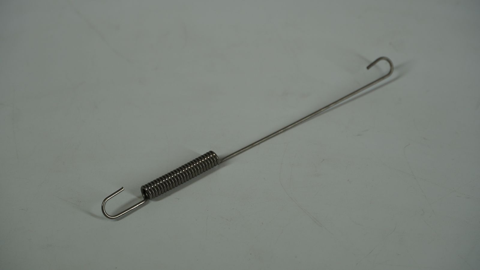 Пружина заднего выключателя тормоза PF401403 BAJAJ