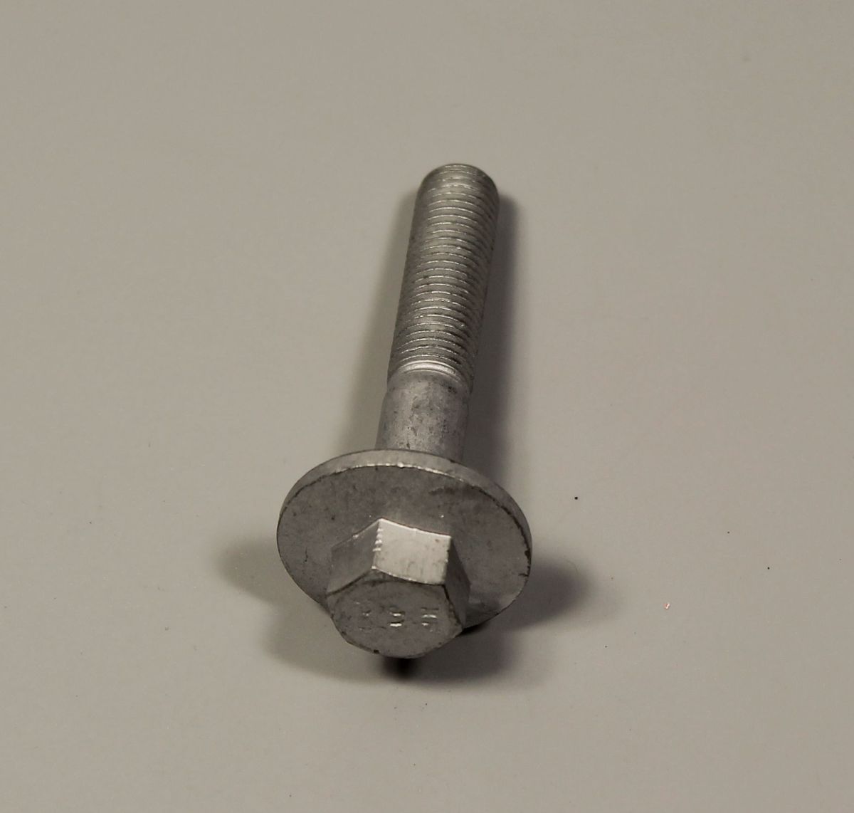 Болт (М10х1.25х55) крепления ротора генератора KTM 90239005050 LAD00124 BAJAJ